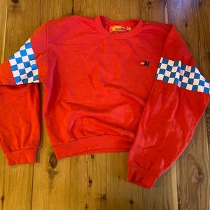 Aviator Nation Limited Edition red crewneck with blue and white checkers sleeves